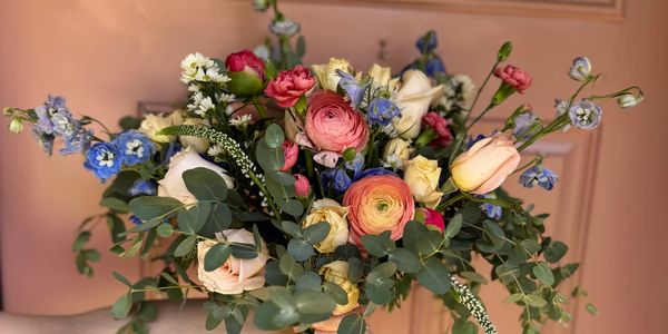Bridal bouquet with delicate blooms & high end elegant flowers. Bold spring colors #ranunculus #rose