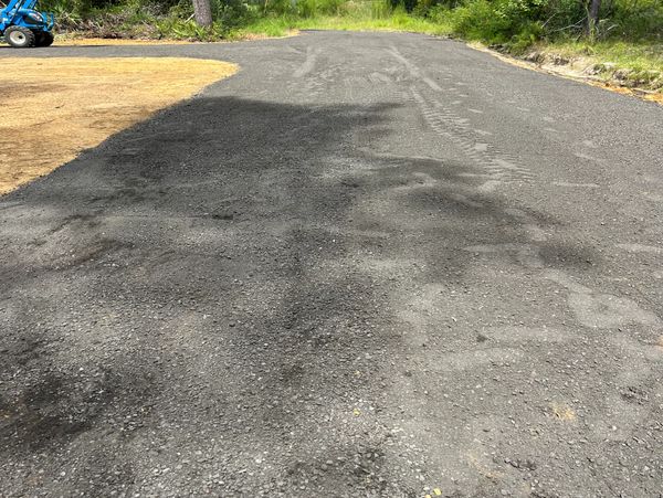 Asphalt millings, grading, dirt work, land management, land clearing, rock driveway, driveway repair