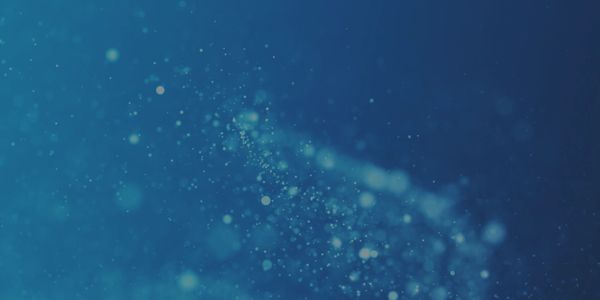 Abstract blue particles representing increasing complexity and momentum.