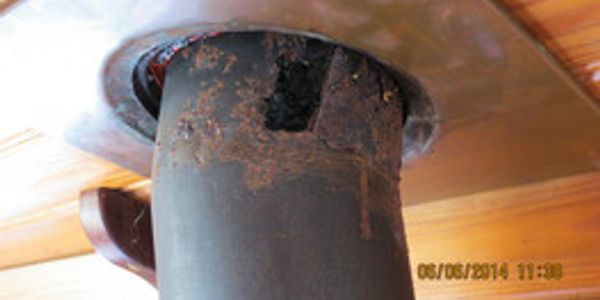 Holed flue pipe