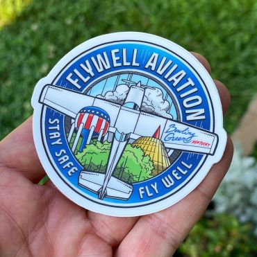 Sticker with airplane and text about safe flying.