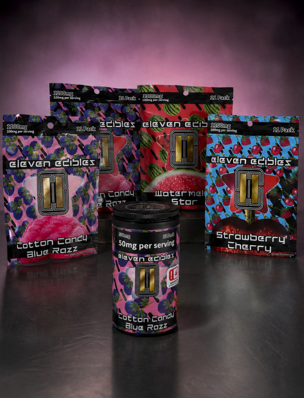 Assortment of Eleven Edibles packages and container.