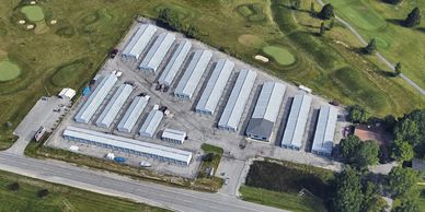 Aerial view of storage units near a golf course.