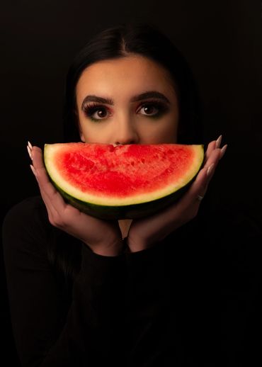 Beautiful women holding watermelon