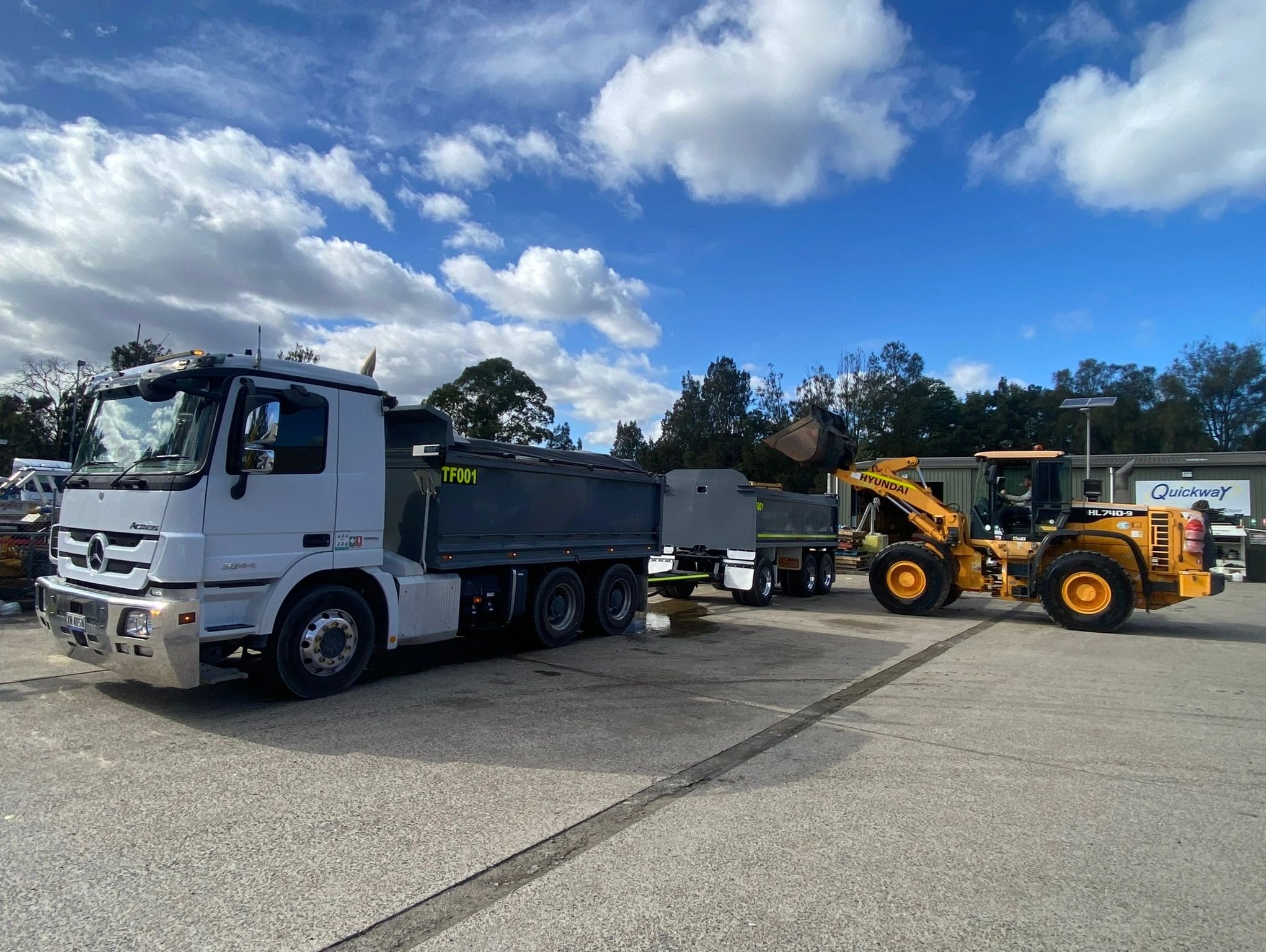 Loader and truck available for hire