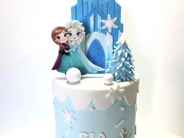 Frozen-themed cake with Elsa and Anna.