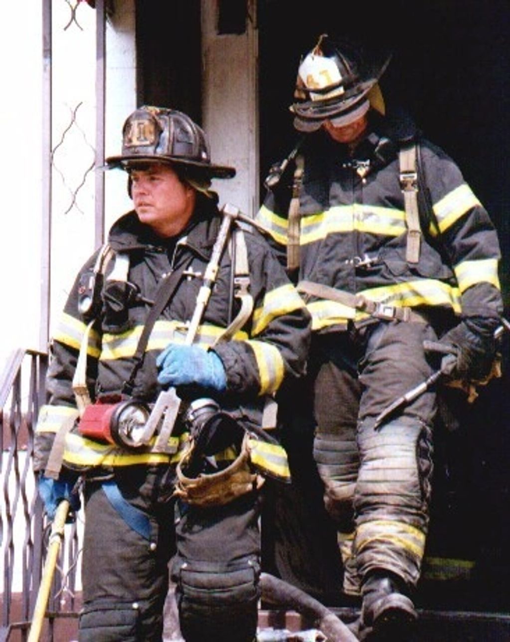 Ed Walsh followed by Lieutenant Mike Healey after a fire in South Bronx