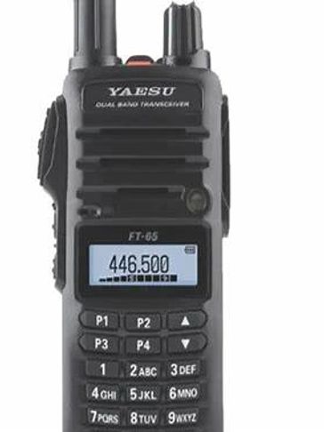 Handheld Yaesu FT-65 dual band transceiver radio with keypad.