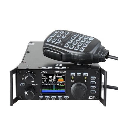 Compact HF transceiver with a handheld microphone and color display.