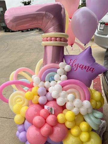 Colorful balloon arrangement for a 7th birthday.