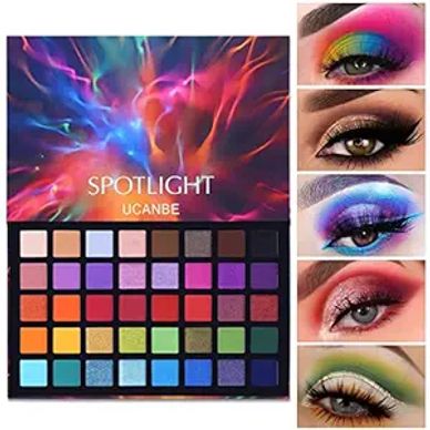 Colorful eyeshadow palette with vibrant makeup looks.