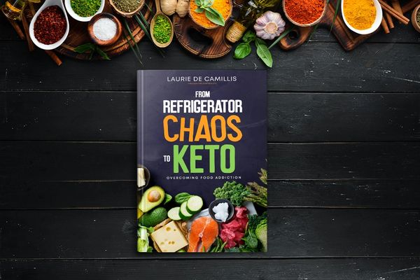 keto diet memoir book and basic foods on a table 