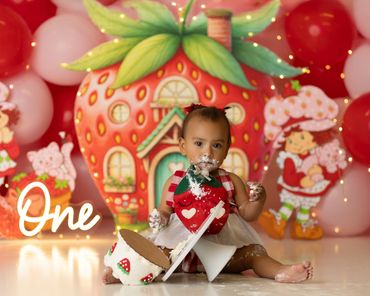 Cake Smash session image of little girl dumping over cake during her studio session in Corona, Ca.