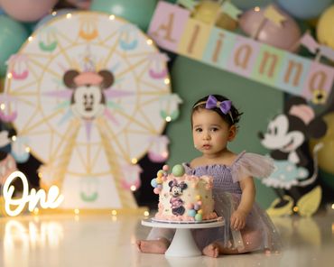 pastel Disney cake smash session with little girl during her studio session in Chino Hills, Ca.