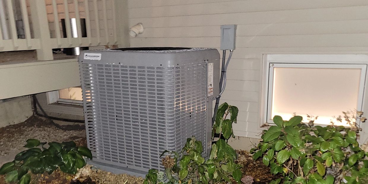 air conditioning unit sitting outside. 