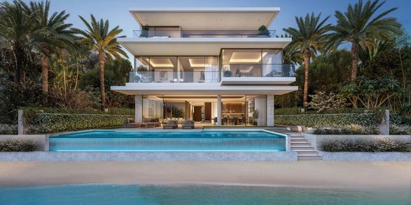 Discover the Luxury Beach Villa Collection, featuring a grand double-height foyer and direct access.