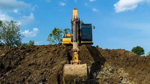 Excavating and demolition work in Jefferson County, Alabama on top of hill, land clearing.