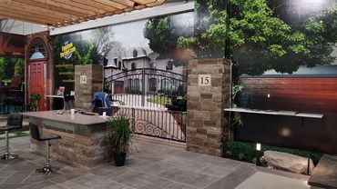 Digitally printed interior wall graphics to look like outside for Flagstone Porches .