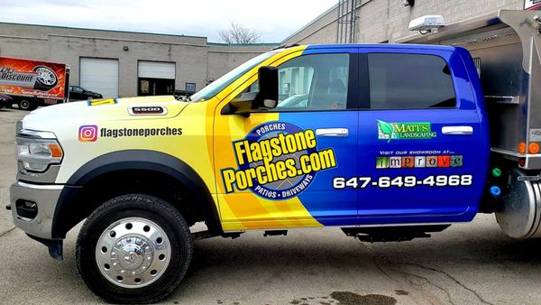 White Dodge Ram with full digital printed wrap for Flagstone Porches.com 