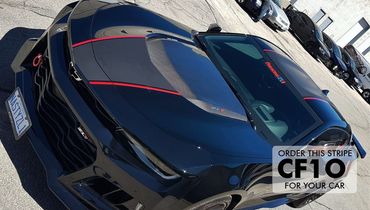 Black Camaro ZL1 with red racing stripes and custom license plate.