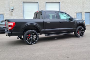 Ford F150 wrapped from gloss black to satin black.