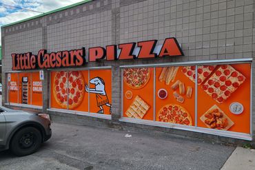 3 sets of 5' x 12' windows digitally printed windows for Little Caesars Pizza.