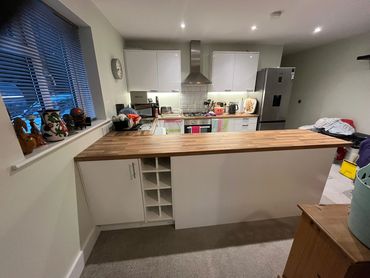 #Bespoke #breakfastbarwith #winerack that has been made out of base cabinets and MDF.