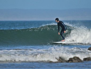 William surfing at Second Point, San Juanico