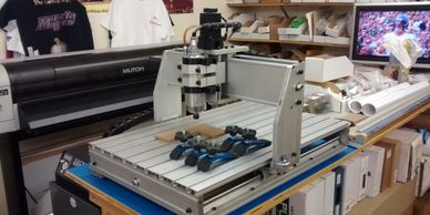 Our CNC allows us to make holding fixtures for painting or printing as large as 18 x 24 inches.  Fix