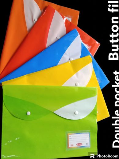 Colorful plastic button folders with double pockets neatly stacked.