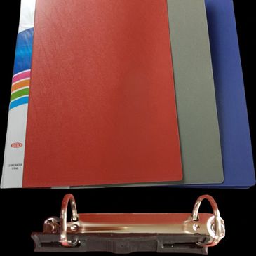 Three colorful binders in red, gray, and blue on a black background.