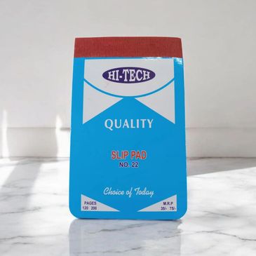 A blue Hi-Tech quality slip pad with red top and white text on a marble surface.