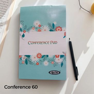 Floral-themed conference pad with a pen on the side.