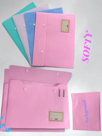 Colorful soft plastic document folders and envelopes arranged neatly.