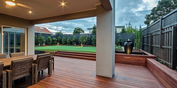 Perfect Landscaping with Brand new decking, stair timber works and artificial turf and planters.