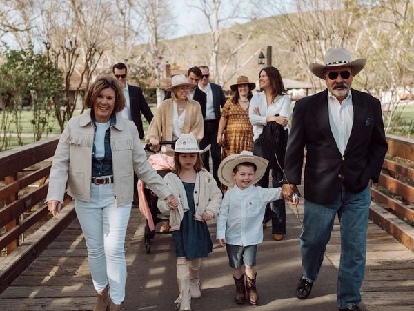 Lawson Family walking over a bridge. 
