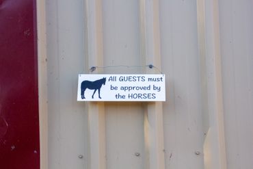 All guests must be approved by the horses sign