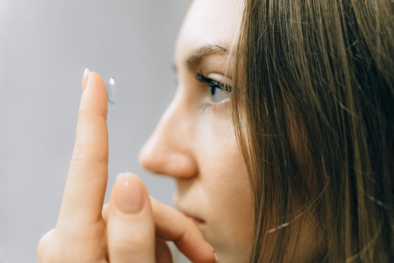 Contact lens on a fingertip