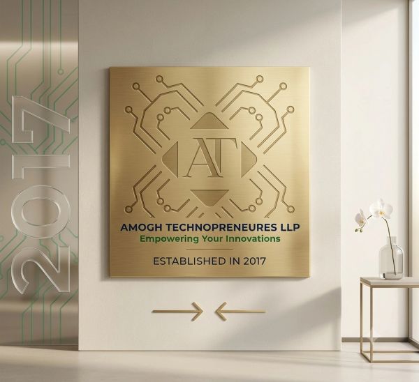 Golden plaque for Amogh Technopreneurs LLP with modern office decor.