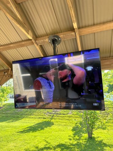 47" TV mounted on patio