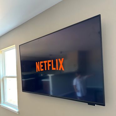 65" TV Mounted on drywall