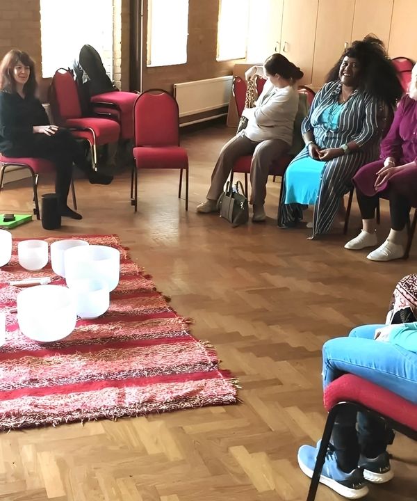 image of women sitting together in therapy