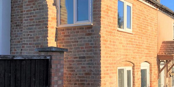 Lime mortar and lime pointing used for brick house restoration.