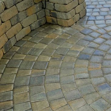 Paver patio in decorative pattern.