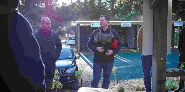 education and training at a gun range, firearms coaching