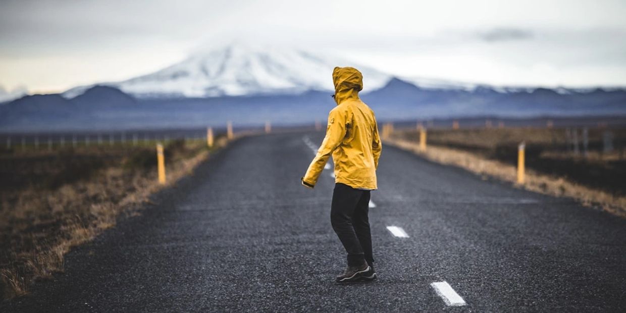 a man walking looking back on his life searching for his purpose