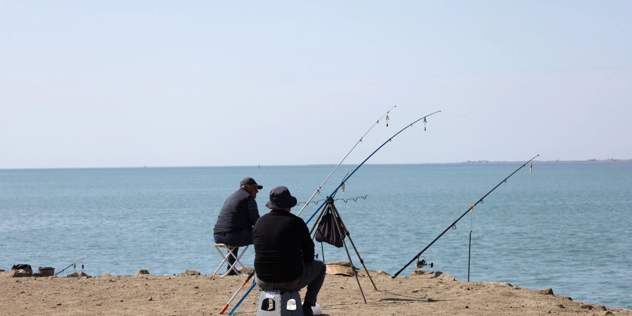 2 men together but not talking. Isolation and Loneliness