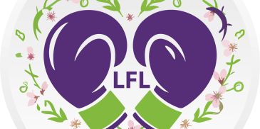 Two purple boxing gloves forming a heart with floral decorations around.