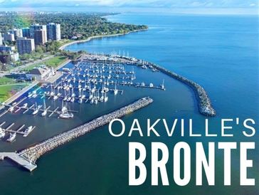 Aerial view of Bronte Harbour in Oakville with boats and shoreline.
