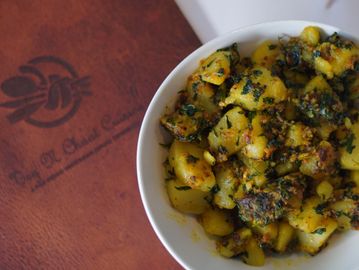 A bowl of Fresh Aloo Methi